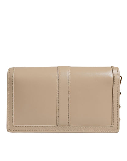 V1 Sac bandoulière portefeuille en cuir de veau beige avec chaîne dorée